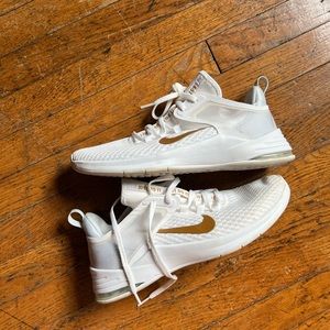 Nike air white and gold. Size 8.5. Worn once. Priced to sell